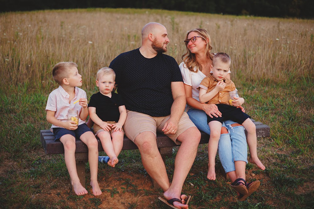 A family gathered in a golden field
